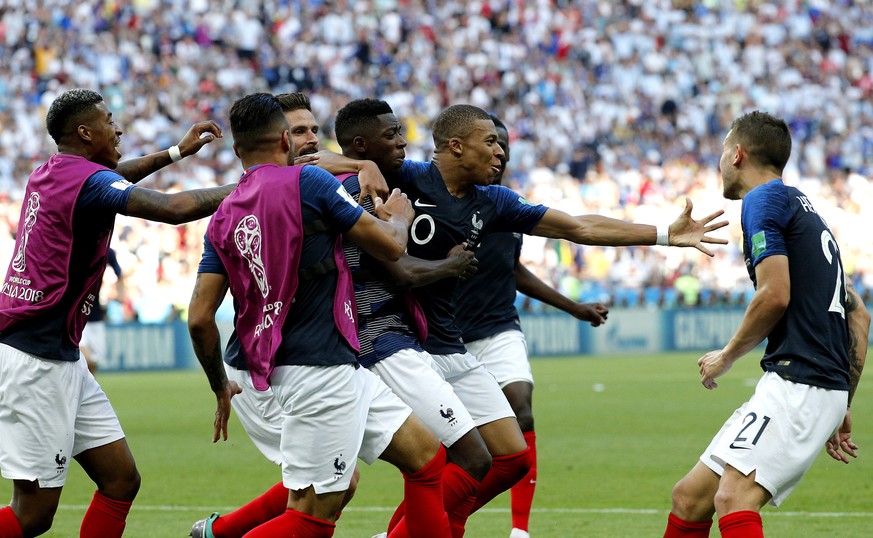 epa06852235 Kylian Mbappe of France (2-R) celebrates with teammates scoring the 4-2 goal during the FIFA World Cup 2018 round of 16 soccer match between France and Argentina in Kazan, Russia, 30 June  ...