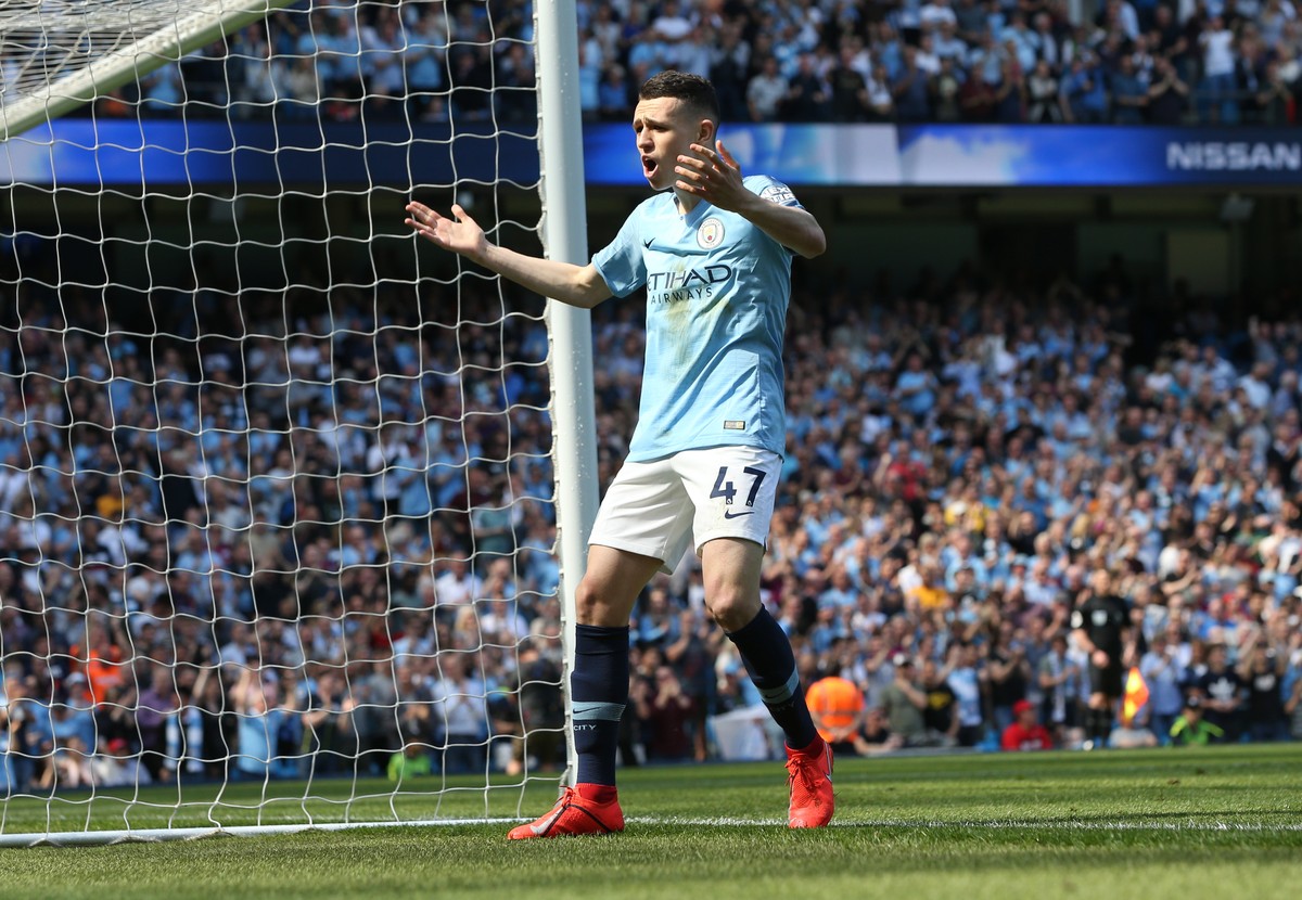 epa07517287 Manchester City's Phil Foden celebrates scoring a goal during the English Premier League soccer match between Manchester City and Tottenham Hotspur at the Etihad Stadium in Manchester ...