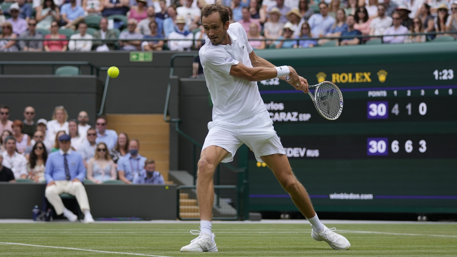 Russia&#039;s Daniil Medvedev plays a return to Spain&#039;s Carlos Alcaraz during the men&#039;s singles second round match on day four of the Wimbledon Tennis Championships in London, Thursday July  ...