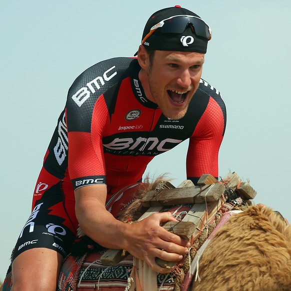 Jean-Pierre Drucker of Luxembourg and the BMC Racing Team sits on a camel at the start of stage four of the 2016 Tour of Qatar, a 189km road stage from Al Zuberah Fort to Madinat Al Shama,l on Februar ...