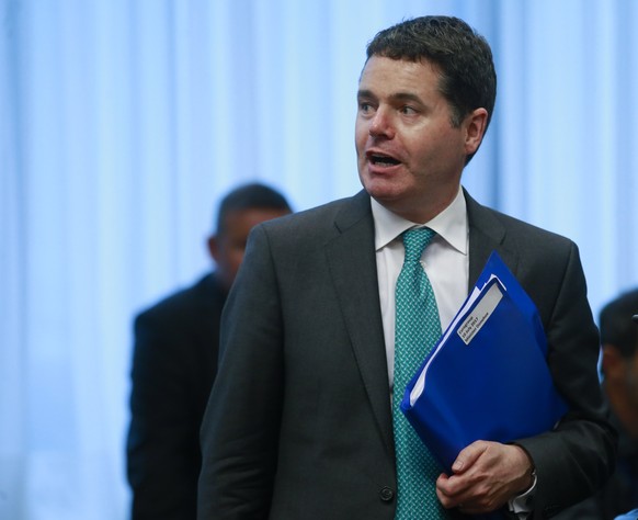 epa06079344 Irish Minister for Finance and Public Expenditure Paschal Donohoe arrives for the start of a Eurogroup Finance Ministers&#039; meeting at the EU Council, in Brussels, Belgium, 10 July 2017 ...