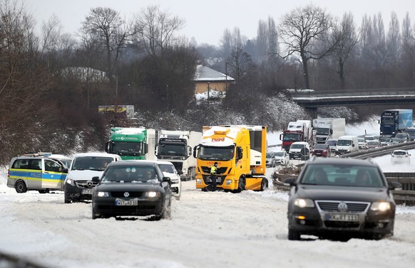 epa08996985 A truck got stuck at an uphill slope on the snow-covered A2 motorway near Dortmund, Germany, 08 February 2021. A heavy winter storm with cold easterly winds brings ice and fresh fallen sno ...