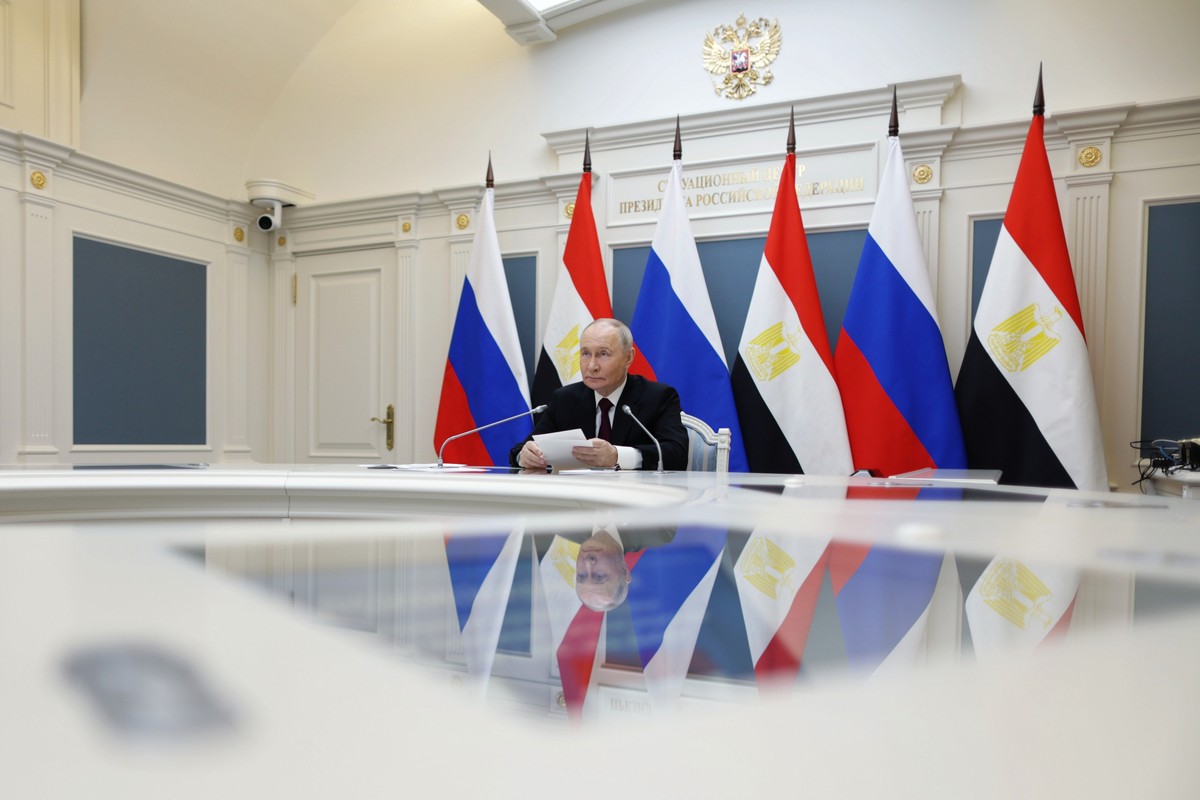 Russian President Vladimir Putin takes part in a ceremony to install the reactor vessel at the first power unit of the Egypt's El Dabaa Nuclear Power Plant via videoconference at the Kremlin in M ...