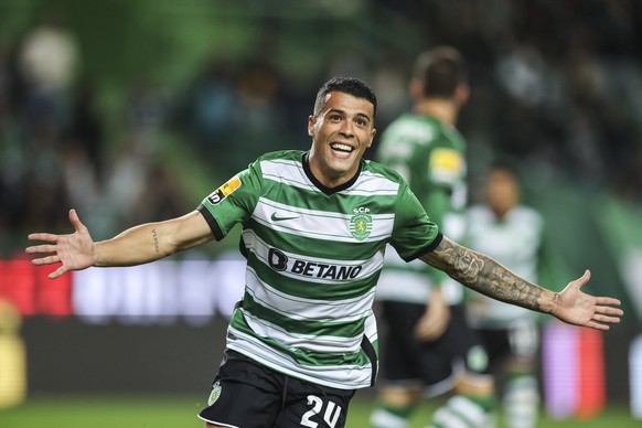 epa10381962 Sporting player Pedro Porro celebrates after scoring the 1-0 opening goal against Pacos de Ferreira during the Portuguese First League soccer match in Lisbon, Portugal, 29 December 2022. E ...