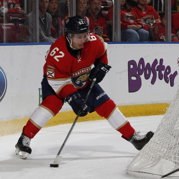 Florida Panthers center Denis Malgin (62) circles the Washington Capitals net with the puck during the first period of an NHL hockey game, Thursday, Oct. 20, 2016, in Sunrise, Fla. The Capitals defeat ...