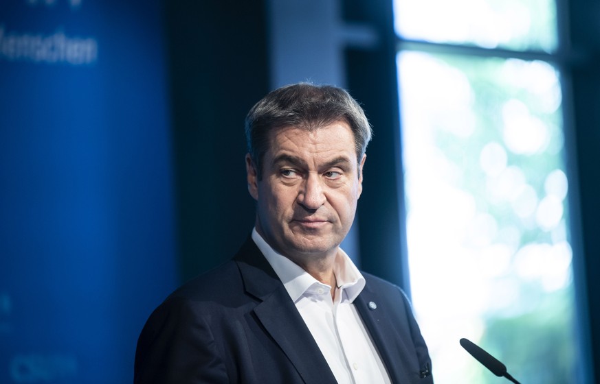 epa09491446 Christian Social Union (CSU) chairman Markus Soeder speaks during a press conference in the aftermath of the German general elections in Munich, Germany, 27 September 2021, a day after the ...