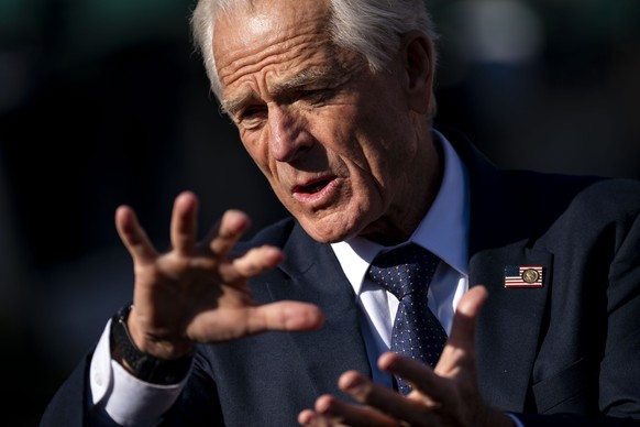 epa11959574 Senior Counselor to the President for Trade and Manufacturing Peter Navarro speaks with the press outside the Oval Office at the White House in Washington, DC, USA, 12 March 2025. EPA/BONN ...