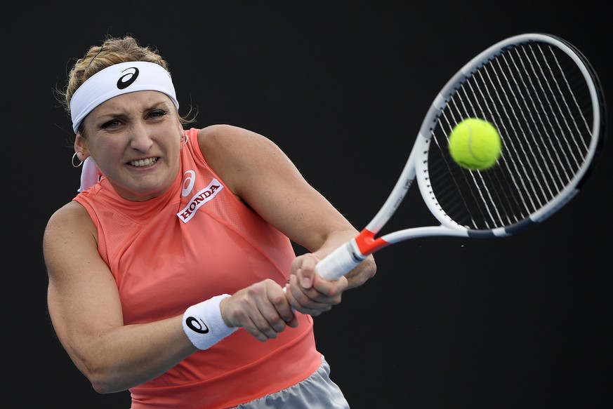 Switzerland&#039;s Timea Bacsinszky makes a backhand return to Russia&#039;s Daria Kasatkina during their first round match at the Australian Open tennis championships in Melbourne, Australia, Tuesday ...
