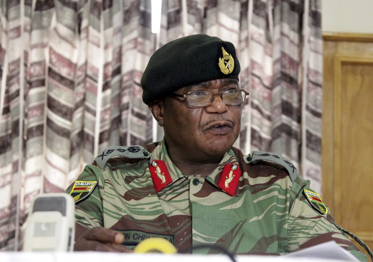 FILE -- In this Monday, Nov. 13, 2017, file photo, Zimbabwe's Army Commander, Constantino Chiwenga addresses a press conference in Harare. Armored personnel carriers were seen outside the capital ...