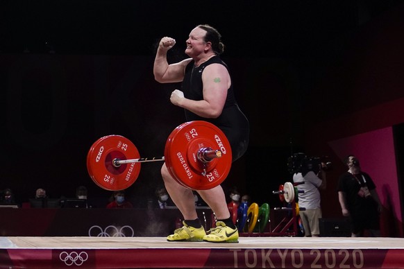 Laurel Hubbard of New Zealand reacts after a lift in the women&#039;s +87kg weightlifting event at the 2020 Summer Olympics, Monday, Aug. 2, 2021, in Tokyo, Japan. (AP Photo/Seth Wenig)