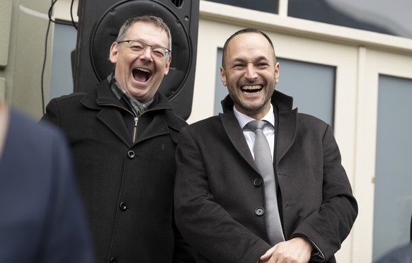 Les conseillers d&#039;Etats valaisans Franz Ruppen, a gauche, et Mathias Reynard, a droite, rigolent lors de la celebration de l&#039;election de la presidence du Conseil federal de la presidente de  ...