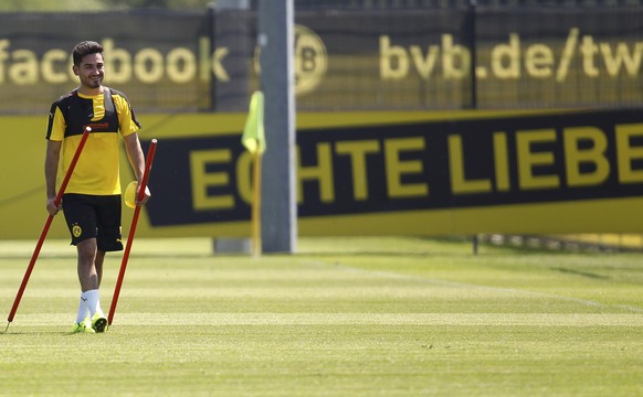 Borussia Dortmund&#039;s Ilkay Guendogan leaves after the first training session for the new soccer season in Dortmund, Germany June 30, 2015. REUTERS/Ina Fassbender