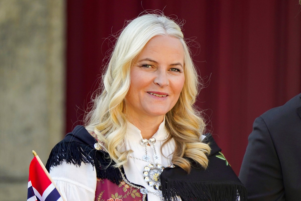 FILE - Norway's Crown Princess Mette-Marit watches a parade on the occasion of Norway's Constitution Day, at Skaugum, their official residence, near Oslo, Wednesday, May 17, 2023. (Lise Aser ...