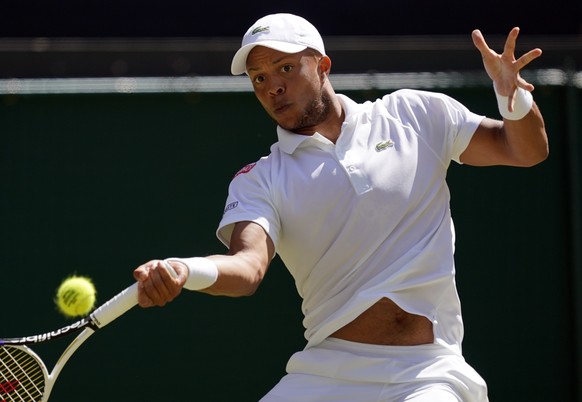 epa07694769 Jay Clarke of Britain returns to Roger Federer of Switzerland in their second round match during the Wimbledon Championships at the All England Lawn Tennis Club, in London, Britain, 04 Jul ...