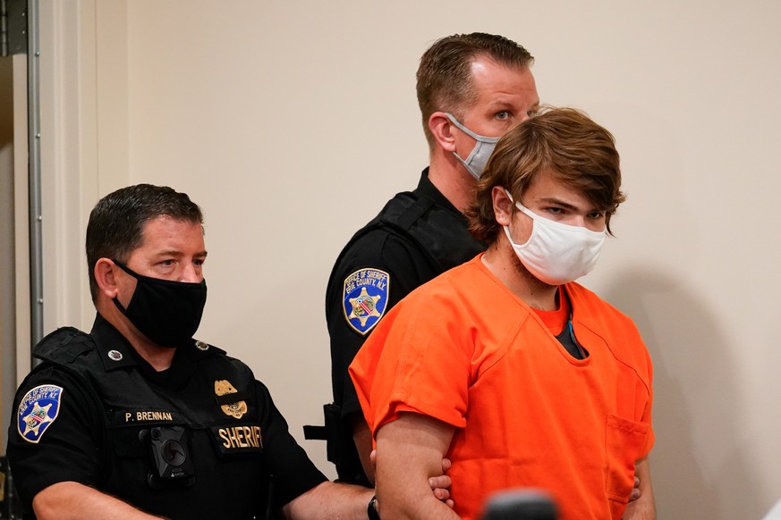 FILE - Payton Gendron is led into the courtroom for a hearing at Erie County Court in Buffalo, N.Y., on May 19, 2022. Gendron, a white gunman who targeted a Buffalo supermarket in a predominantly Blac ...