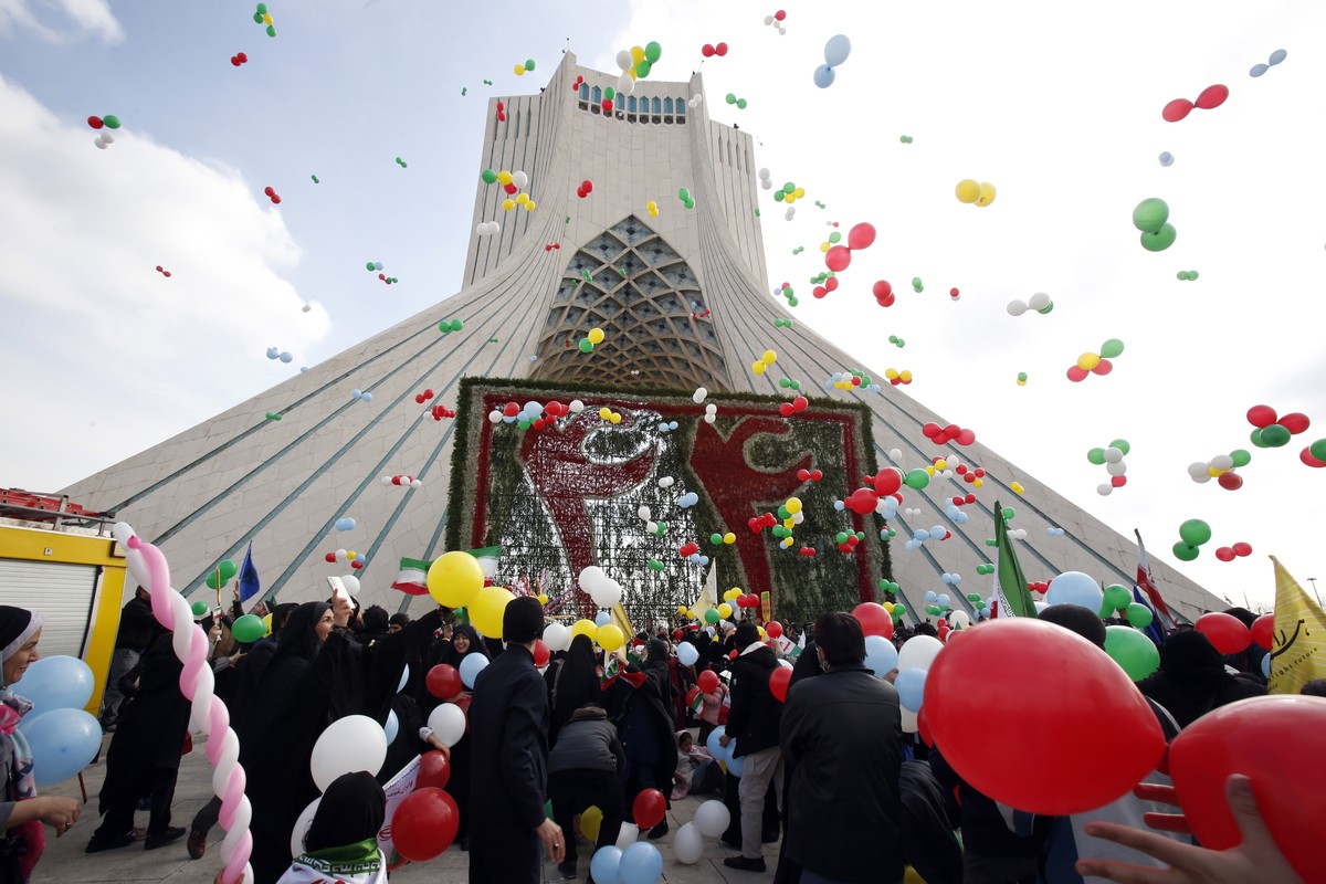 epa10460303 Iranians celebrate during the 44th anniversary of the 1979 Islamic Revolution, at the Azadi (Freedom) square in Tehran, Iran, 11 February 2023. The event marks the 44th anniversary of the  ...