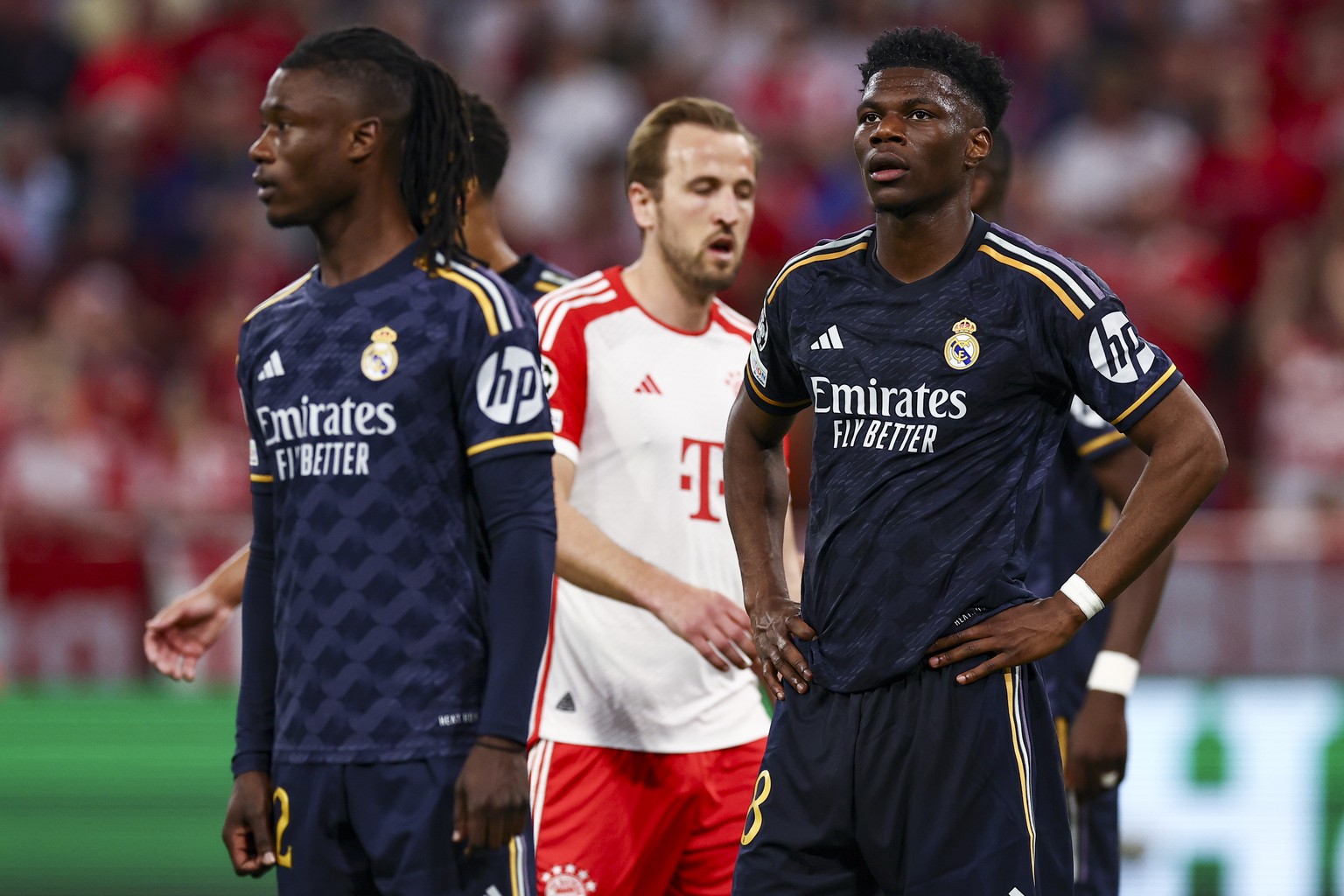 epa11311115 Madrid?s Aurelien Tchouameni (R) reacts during the UEFA Champions League semi final, 1st leg match between Bayern Munich and Real Madrid in Munich, Germany, 30 April 2024. EPA/ANNA SZILAGY ...