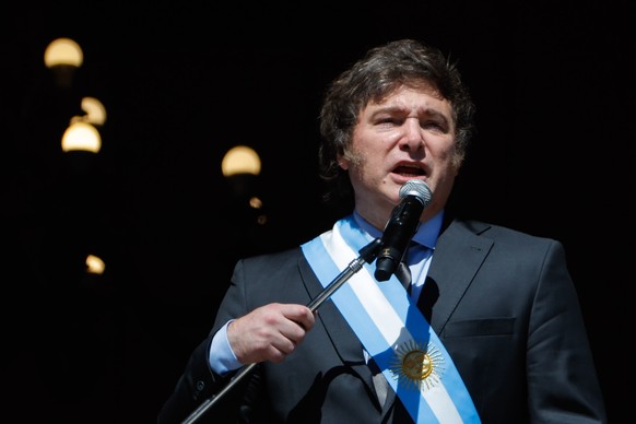 epa11022042 Argentina&#039;s President Javier Milei speaks from the balcony of the Casa Rosada in Buenos Aires, Argentina, 10 December 2023. Milei, arrived at the Casa Rosada (seat of government) for  ...