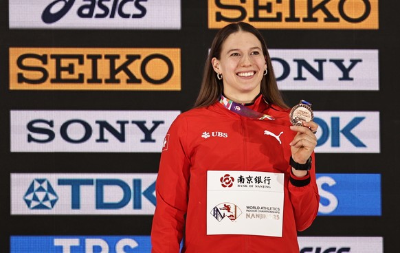 epa11980640 Bronze medalist Angelica Moser of Switzerland poses on the podium during the medal ceremony for the Women&#039;s Pole Vault at the World Athletics Indoor Championships in Nanjing, China, 2 ...