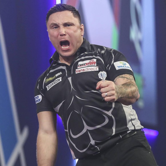 William Hill World Darts Championship Quarter Finals 01/01/2021. Gerwyn Price hits a double and celebrates during the William Hill World Darts Championship quarter finals at Alexandra Palace, London,  ...