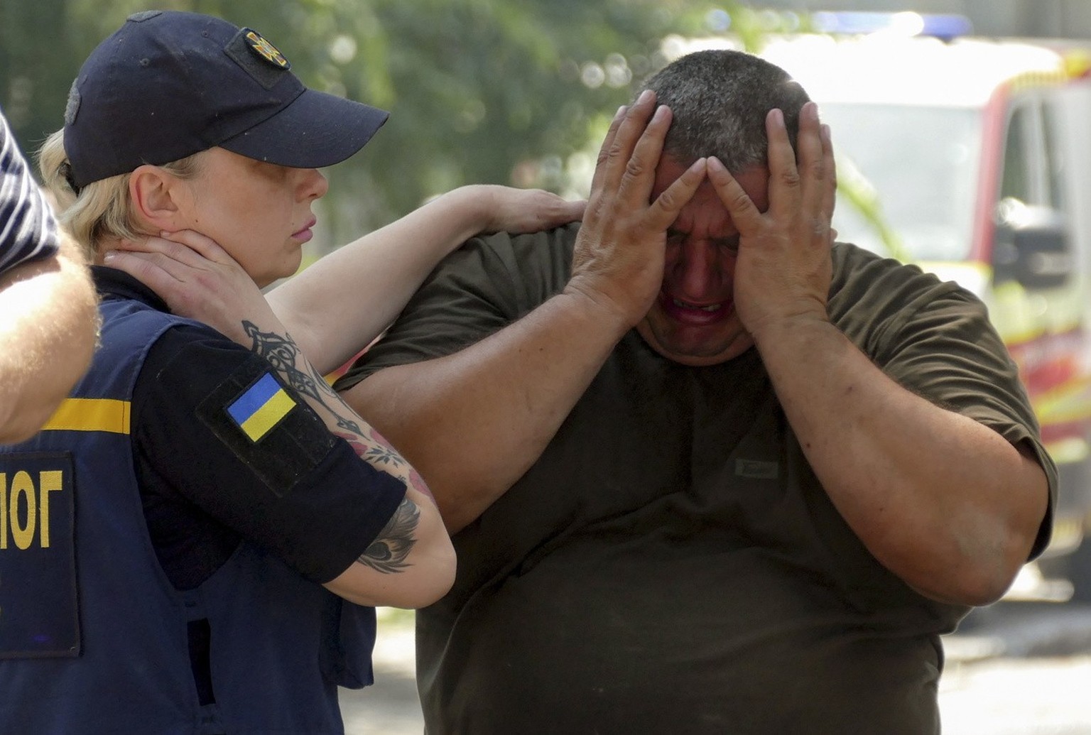 epa10757543 A man reacts at the site of a rocket attack on an administrative building in the southern Ukrainian city of Odesa, Ukraine July 20, 2023. The Ukrainian Air Force reported on July 20 that R…