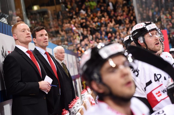 epa05688939 Canadas Assistant Coach Gordie Dwyer, left, and Headcoach Luke Richardson, during the game between HK Dinamo Minsk and Team Canada at the 90th Spengler Cup ice hockey tournament in Davos,  ...