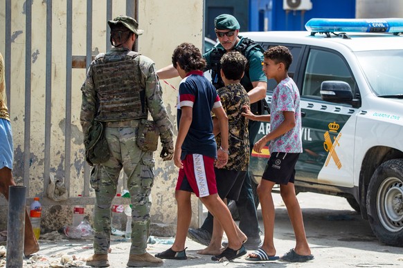 Unaccompanied minors who crossed into Spain return to Morocco from the Spanish enclave of Ceuta, Saturday, Aug. 1, 2026. (AP Photo/Antonio Sempere)
Spain Ceuta