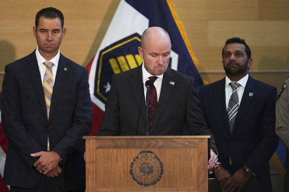 Utah Gov. Spencer Cox becomes emotional while speaking during a press conference at Utah Valley University, Friday, Sept. 12, 2025, in Orem, Utah, regarding the killing of Charlie Kirk, the CEO and co ...