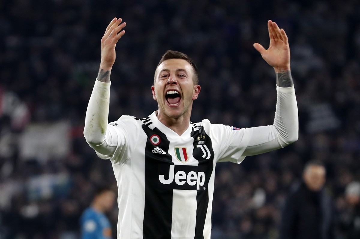 Juventus' Federico Bernardeschi celebrates at the end of the Champions League round of 16, 2nd leg, soccer match between Juventus and Atletico Madrid at the Allianz stadium in Turin, Italy, Tuesd ...