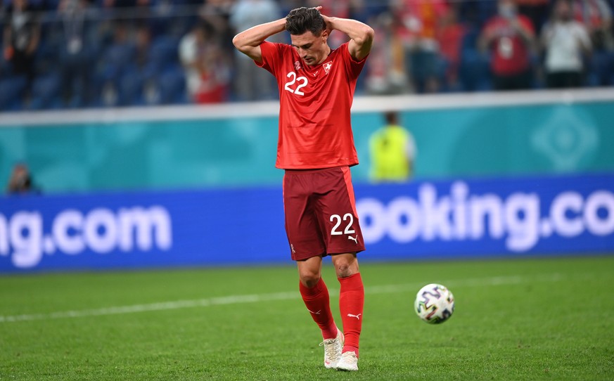 epa09318714 Fabian Schaer of Switzerland reacts after failing to score during the penalty shoot-out of the UEFA EURO 2020 quarter final match between Switzerland and Spain in St.Petersburg, Russia, 02 ...