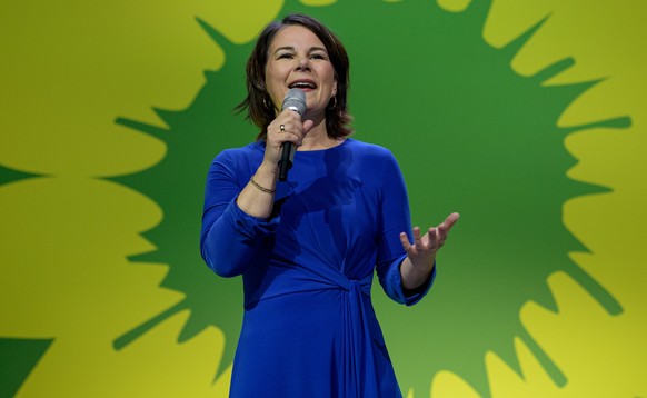 epa09490296 Annalena Baerbock, chancellor candidate of the German Greens Party reacts to initial results at the Columbiahalle venue during the Green party (Alliance 90/The Greens) election event in Be ...