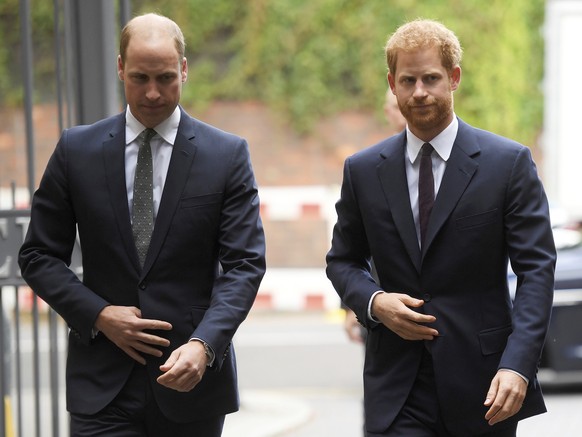 Britain&#039;s Prince William, the Duke of Cambridge, left, and Prince Harry arrive to visit the Support4Grenfell Community Hub in London, Tuesday, Sept. 5, 2017. (Toby Melville/ Pool via AP)