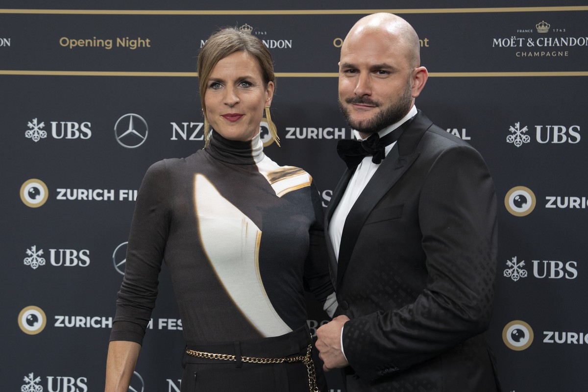 Journalists Cornelia Boesch and Michael Rauchenstein arrive on the Green Carpet at the Opening Night of the 20th Zurich Film Festival (ZFF) in Zurich, Switzerland, on Thursday, October 3, 2024. (KEYST ...