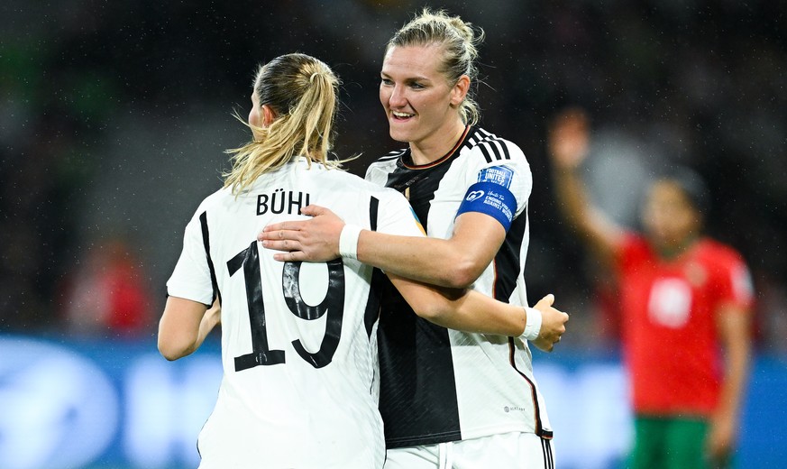 epa10765768 Klara Buehl (L) of Germany celebrates with Alexandra Popp of Germany after scoring the 3-0 goal during the FIFA Women&#039;s World Cup group H soccer match between Germany and Morocco in M ...