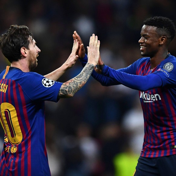 Mandatory Credit: Photo by Javier Garcia/BPI/Shutterstock 9913632cd Lionel Messi of Barcelona celebrates his second goal with Nelson Semedo Tottenham Hotspur v Barcelona, UEFA Champions League Group B ...
