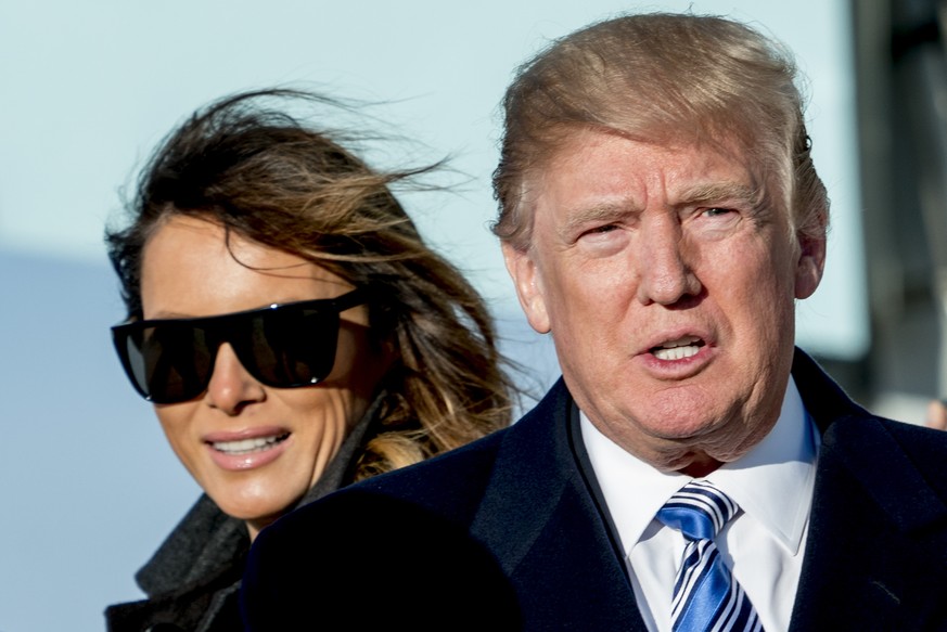 President Donald Trump and first lady Melania Trump arrive at Andrews Air Force Base, Md., Saturday, March 3, 2018 to board Marine One for a short trip to the White House. (AP Photo/Andrew Harnik)