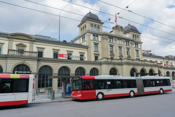 Winterthur, ZH / Switzerland - April 8, 2019: Winterthur train station with city buses waiting at the bus stop