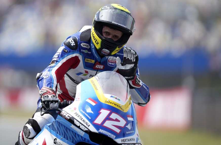 Kalex rider Thomas Luthi of Switzerland waves after the Moto2 race at the Dutch Grand Prix in Assen, northern Netherlands, Sunday, June 27, 2021. (AP Photo/Peter Dejong)