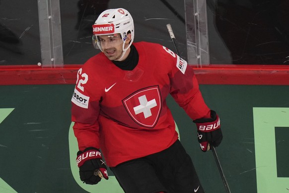 Switzerland&#039;s Denis Malgin reacts after scoring during the semifinal match between Denmark and Switzerland at the ice hockey world championships in Stockholm,Sweden, Saturday, May 24, 2025. (AP P ...