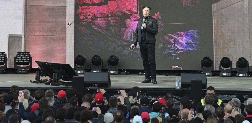 Elon Musk, Tesla CEO, arrives at an open house at the Tesla Gigafactory in Gruenheide, east of Berlin, Saturday Oct. 9, 2021, as the first vehicles are to roll off the production line from the end of  ...