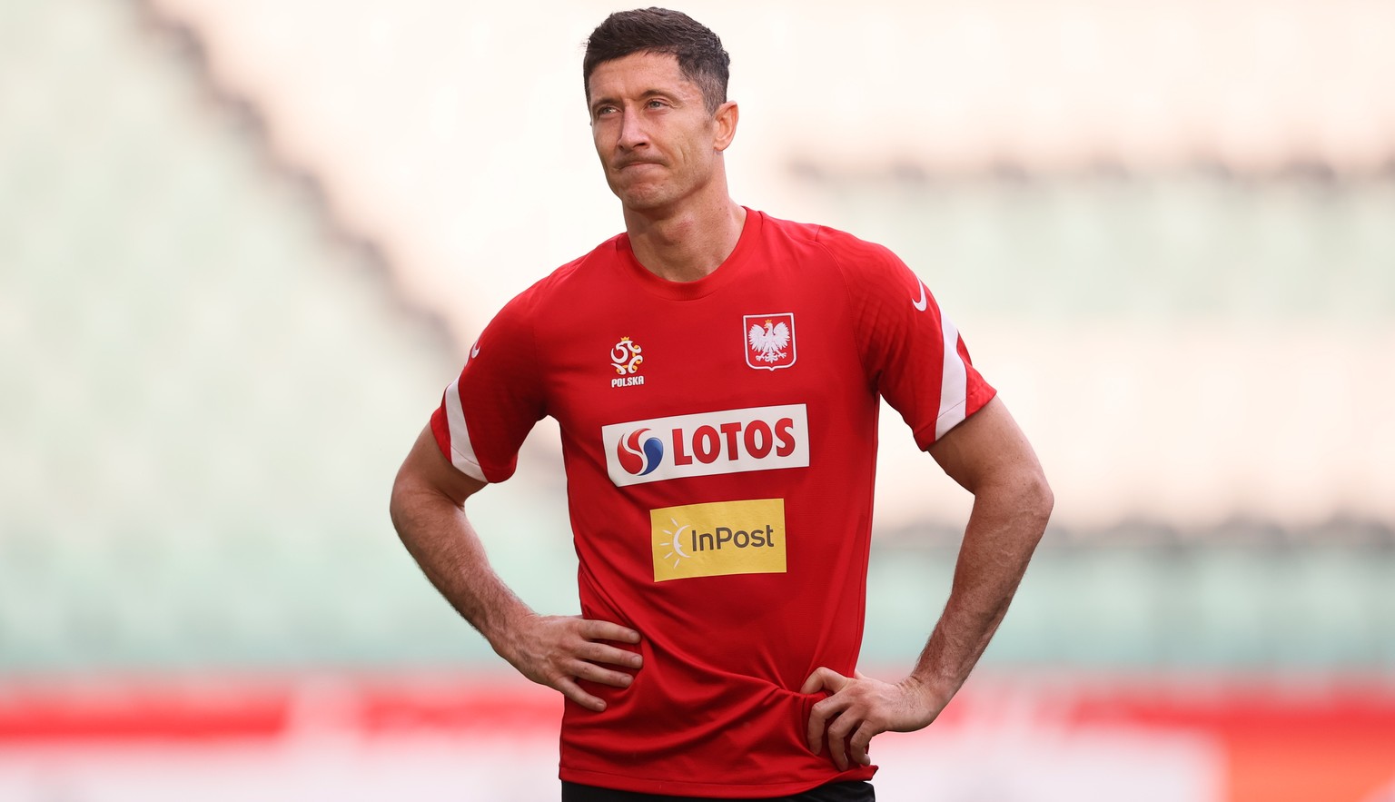 epa09999436 Polish national soccer team player Robert Lewandowski reacts during the team's training session in Warsaw, Poland, 06 June 2022. Poland will face Belgium in their UEFA Nations League socce ...