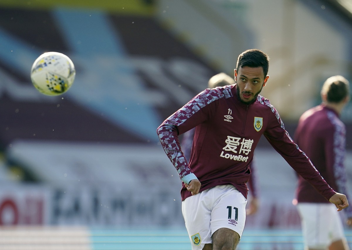 Burnley's Dwight McNeil kicks the ball during warm up before the English League Cup soccer match between Burnley and Sheffield United at the Turf Moor stadium in Burnley, England, Thursday, Sept. ...