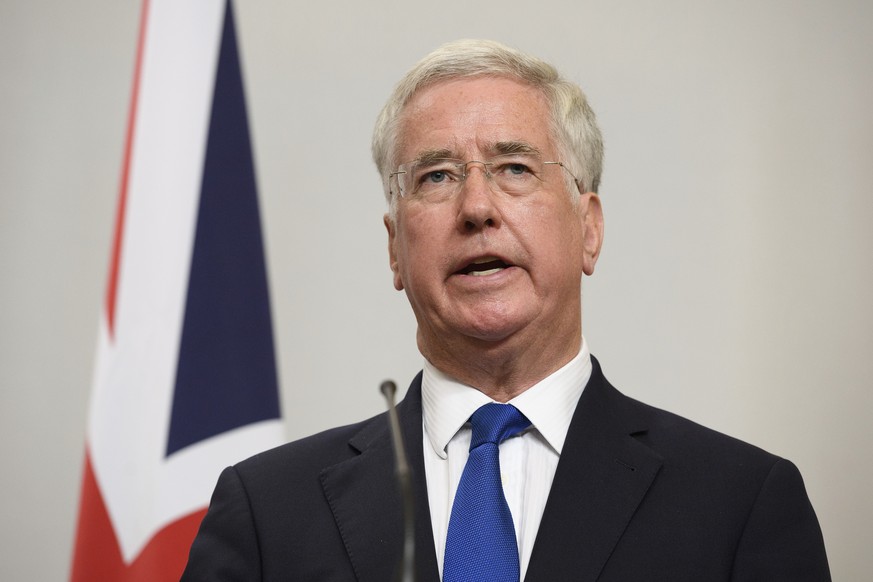 Britain&#039;s Defence Secretary, Michael Fallon, addresses members of the media during a joint UK/Poland press conference in the Foreign and Commonwealth Office Thursday, Oct. 12, 2017 in London. The ...