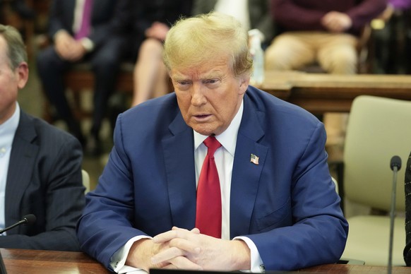 FILE - Former President Donald Trump sits in the courtroom before the start of closing arguments in his civil business fraud trial at New York Supreme Court, Jan. 11, 2024, in New York. (AP Photo/Seth ...