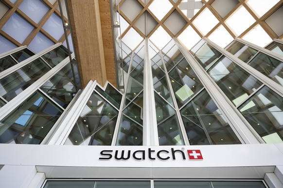 The logo of Swatch at the headquarter, prior to a press conference to present the annual results for 2024, Wednesday, March 19, 2025, in Biel, Switzerland. (KEYSTONE/Peter Klaunzer)
