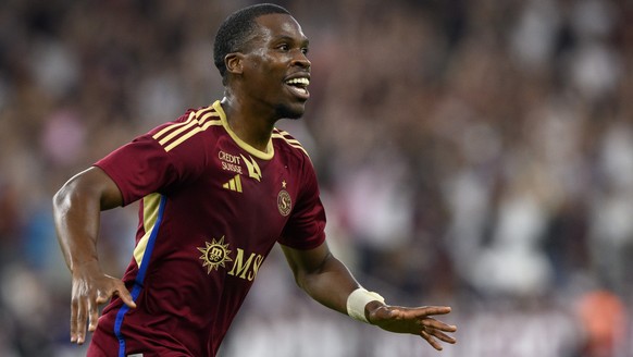 Servette&#039;s forward Dereck Kutesa celebrates his first goal during the UEFA Champions League Third qualifying round second leg soccer match between Switzerland&#039;s Servette FC and Scotland&#039 ...
