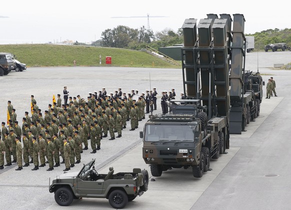 Type-12 surface-to-ship missile launchers are seen at the inauguration ceremony of a missile regiment of the Japan Ground Self-Defense Force in Uruma, Okinawa, southern Japan, on March 30, 2024. (Kyod ...