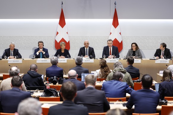 epa10532745 (L-R) Axel Lehmann, Chairman Credit Suisse, Colm Kelleher, Chairman UBS, Swiss Finance Minister Karin Keller-Sutter, Swiss Federal President Alain Berset, Thomas J. Jordan, Chairman Swiss  ...