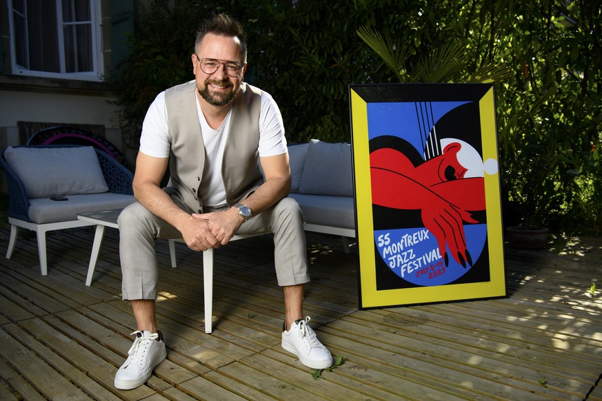 Montreux Jazz Festival director Mathieu Jaton of Switzerland poses in front of a poster during the announcement of the program of the upcoming 55th Montreux Jazz Festival, MJF, during the coronavirus  ...