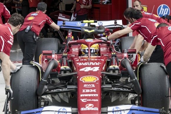 epa12072229 Scuderia Ferrari driver Lewis Hamilton of Britain in the pit lane during the qualifying race of the 2025 Formula 1 Miami Grand Prix at the Miami International Autodrome in Miami Gardens, F ...